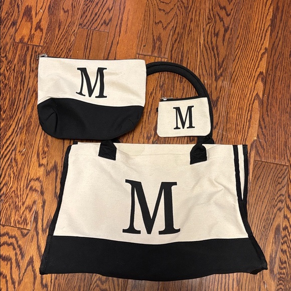 Handbags - Monogram M bag Black and Cream Tote Bag
